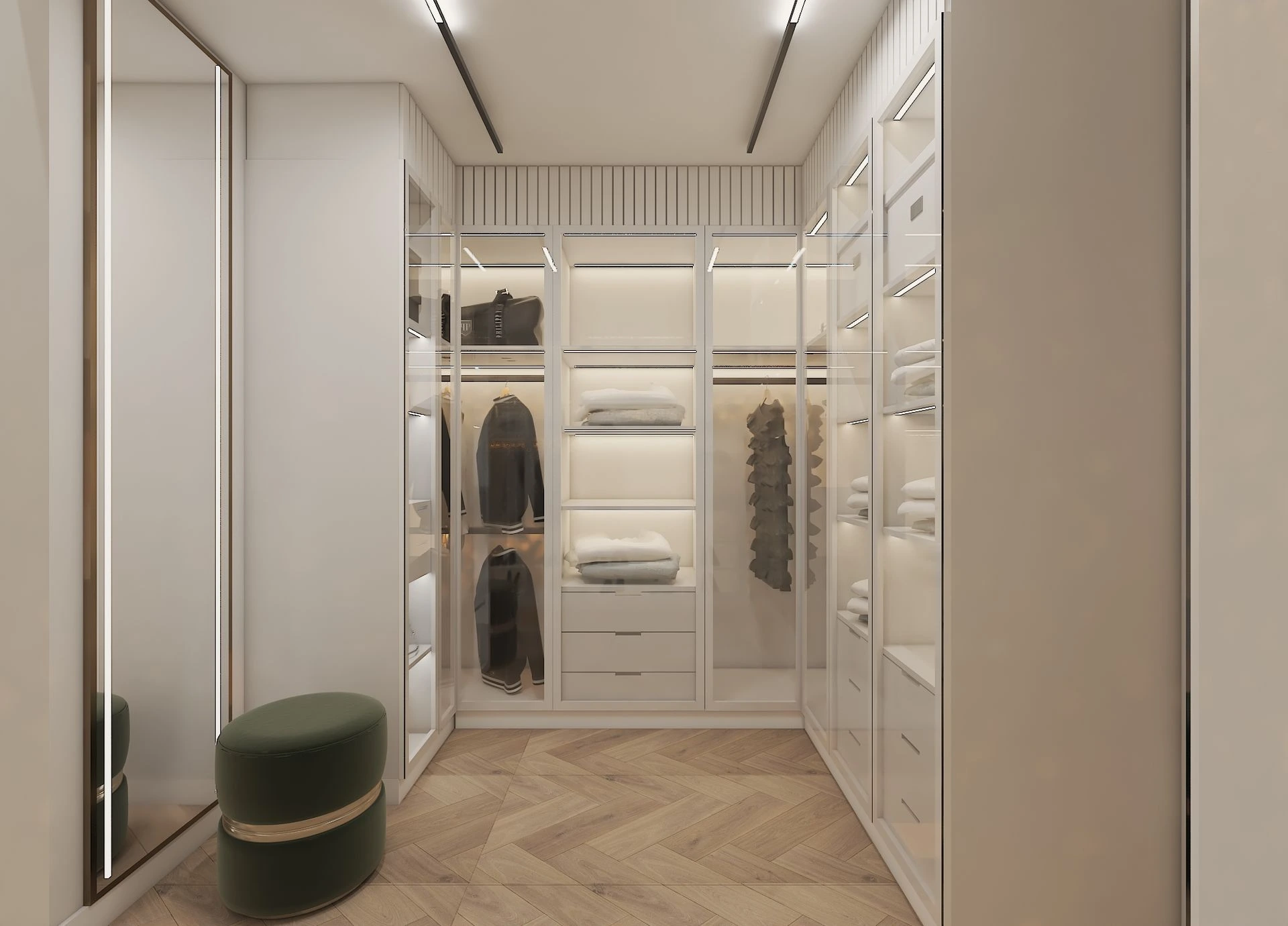 Glass-fronted wardrobes with lit shelves and shoe displays in a walk-in dressing room, Dubai