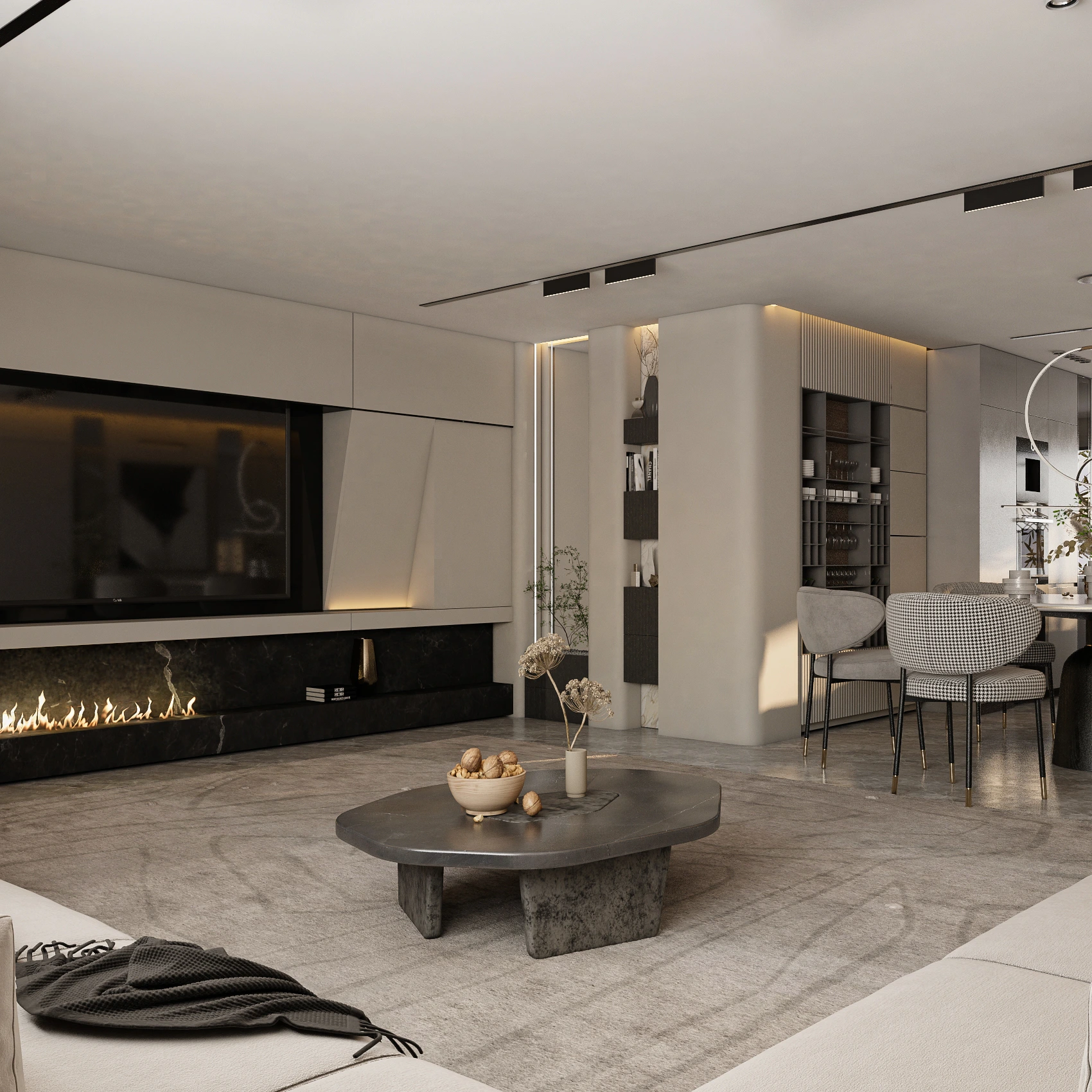Open-plan living area with linear fireplace and pebble coffee table, Dubai