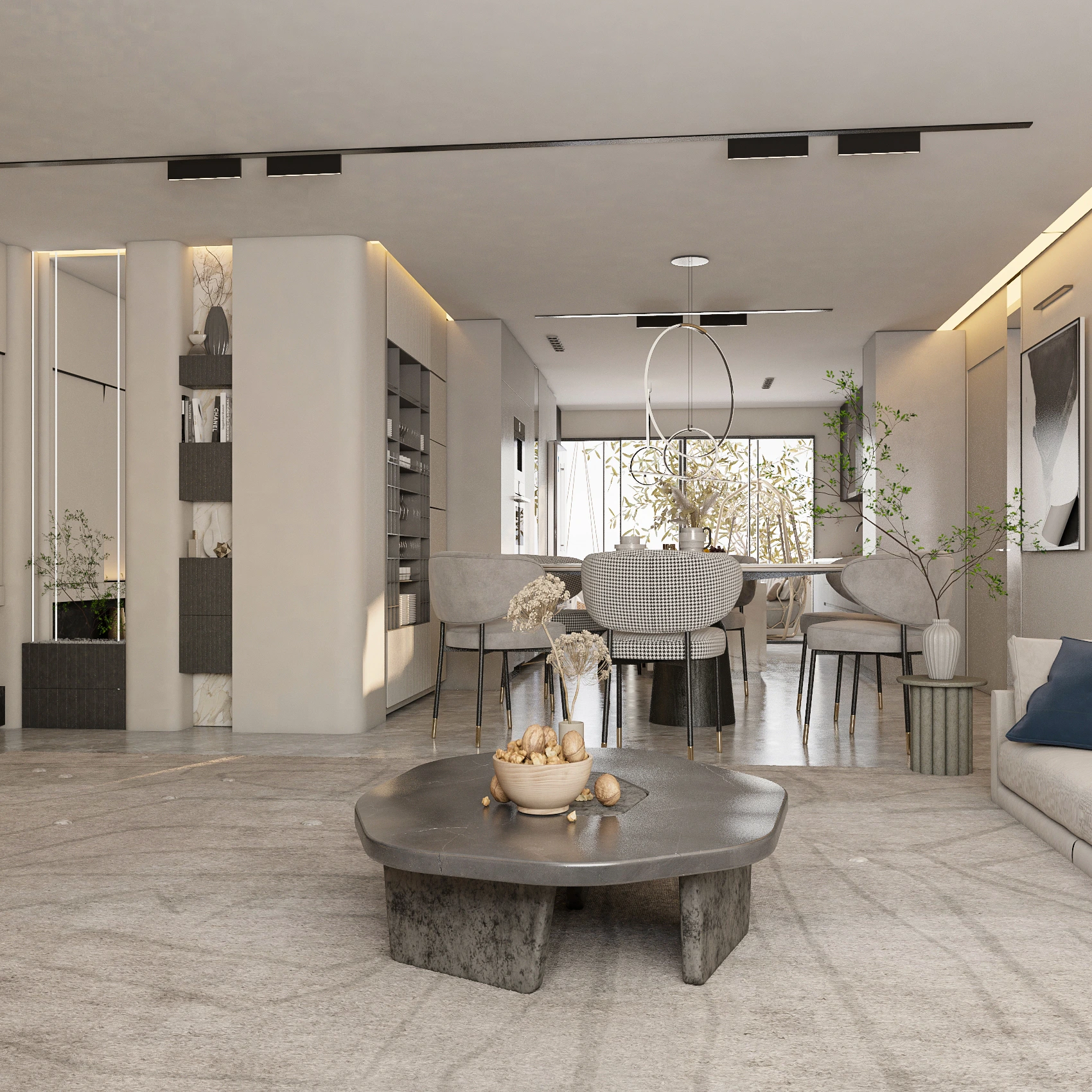 Open-plan living area with linear fireplace and pebble coffee table, Dubai